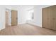 Bright bedroom with hardwood floors and double closets; perfect for comfort and storage at 388 Hampton Hills Ct, Debary, FL 32713