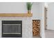 Elegant fireplace with a stone surround and a wooden mantel at 388 Hampton Hills Ct, Debary, FL 32713