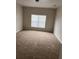 Spacious bedroom with carpet floors and natural light at 4034 Bougainvillea Pl, Kissimmee, FL 34746