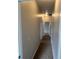 Hallway with neutral walls and carpeted floor at 4034 Bougainvillea Pl, Kissimmee, FL 34746