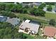 Aerial view of home with fenced pool, new roof, landscaping, and stone accents near a scenic greenway at 414 Bonifay Ave, Orlando, FL 32825