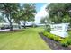 Rio Pinar Golf & Country Club featuring manicured grounds and stately trees at 414 Bonifay Ave, Orlando, FL 32825