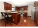 Updated kitchen with stainless steel appliances, granite countertops, and a breakfast bar at 414 Bonifay Ave, Orlando, FL 32825