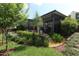 Screened-in pool area with lush landscaping adding privacy and natural beauty at 414 Bonifay Ave, Orlando, FL 32825