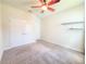 Bedroom with ceiling fan, carpet and closet perfect for relaxation and rest at 4632 Egg Harbor Dr, Kissimmee, FL 34746