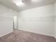 Spacious walk-in closet with carpet and wire shelving provides ample storage at 4632 Egg Harbor Dr, Kissimmee, FL 34746