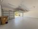 Spacious two car garage with ample lighting and epoxy flooring at 4632 Egg Harbor Dr, Kissimmee, FL 34746