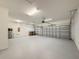 Spacious two car garage with ample lighting and epoxy flooring at 4632 Egg Harbor Dr, Kissimmee, FL 34746