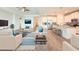 Spacious living room featuring modern furniture, neutral colors, and an open concept design at 4632 Egg Harbor Dr, Kissimmee, FL 34746