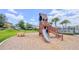 Community playground with slides and tower on a mulch surface at 4632 Egg Harbor Dr, Kissimmee, FL 34746