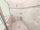 Modern shower features custom tile work, a rainfall showerhead and built-in shelving at 4632 Egg Harbor Dr, Kissimmee, FL 34746