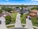 Aerial view of the property, showcasing lush landscaping and the surrounding neighborhood at 470 Regal Downs Cir, Winter Garden, FL 34787