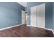Carpet-free bedroom featuring a double-door closet, offering ample space and storage at 470 Regal Downs Cir, Winter Garden, FL 34787