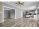 Open floor plan with views of the kitchen and abundant natural light at 470 Regal Downs Cir, Winter Garden, FL 34787