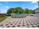 Backyard pool, surrounded by a patio and lush landscaping, perfect for outdoor enjoyment at 470 Regal Downs Cir, Winter Garden, FL 34787