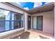 Welcoming entrance with tiled patio, large windows, and sliding glass door with a view at 489 Meadowood Blvd, Fern Park, FL 32730