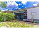 Condominium complex with screened-in porch and exterior view at 489 Meadowood Blvd, Fern Park, FL 32730