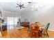 Open living area with hardwood floors, vaulted ceilings, and large windows, perfect for entertaining at 489 Meadowood Blvd, Fern Park, FL 32730