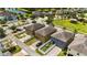 An aerial showcases neat homes, garages, fenced yards in a well-kept residential neighborhood at 5217 Creekside Park Ave, Orlando, FL 32811