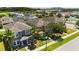A high-angle showcases the neighborhood's homes, green spaces, and community amenities at 5217 Creekside Park Ave, Orlando, FL 32811