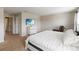 Bedroom features a TV, furniture, carpet, and natural light at 5217 Creekside Park Ave, Orlando, FL 32811