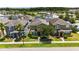 Charming two-story home features manicured landscaping, a welcoming entrance, and a well-maintained lawn at 5217 Creekside Park Ave, Orlando, FL 32811