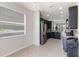 Bright kitchen showcases dark cabinets, stainless steel appliances, and a tile floor at 5217 Creekside Park Ave, Orlando, FL 32811