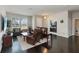 Spacious living room with hardwood floors, comfortable seating, and a bright, inviting atmosphere at 5217 Creekside Park Ave, Orlando, FL 32811