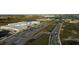 Aerial view of a school building with parking lots, athletic fields, and surrounding roads at 5308 Citrus Leaf Blvd, Winter Garden, FL 34787