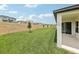 Expansive backyard, perfect for outdoor activities and relaxation with a view of other homes at 5308 Citrus Leaf Blvd, Winter Garden, FL 34787