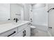 Bathroom featuring quartz countertop, black fixtures, and bath tub at 5308 Citrus Leaf Blvd, Winter Garden, FL 34787