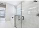Bright bathroom with a soaking tub, large glass shower, and modern fixtures at 5308 Citrus Leaf Blvd, Winter Garden, FL 34787