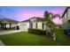 Beautiful single-story home with a well-maintained lawn and landscaping, showcasing curb appeal at 622 Taft Dr, Davenport, FL 33837