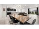 Open-concept living space showcases a modern kitchen, dining area, and a comfortable living room at 622 Taft Dr, Davenport, FL 33837