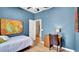 Bedroom with a desk and chair and vaulted ceiling at 6462 S Goldenrod Rd # 31B, Orlando, FL 32822