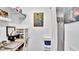 Cozy office nook featuring floating shelves, decor, and a dedicated workspace, perfect for productivity and organization at 6462 S Goldenrod Rd # 31B, Orlando, FL 32822