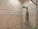 Modern shower featuring tile walls, rainfall shower head and grab bars for safety at 826 Sheen Cir Cir, Haines City, FL 33844