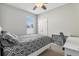 Bedroom featuring a bed, desk, and natural light at 827 Timber Isle Dr, Orlando, FL 32828