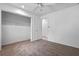 Clean, carpeted bedroom with a door, closet, and a fan overhead at 885 Little Bend Rd, Altamonte Springs, FL 32714