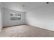 Spacious carpeted bedroom with a window providing natural light at 885 Little Bend Rd, Altamonte Springs, FL 32714