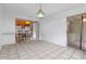 Bright dining room with tiled floors and adjacent kitchen and access to the outdoors at 885 Little Bend Rd, Altamonte Springs, FL 32714