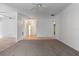 Open living room with tile flooring, ceiling fan and access to the foyer at 885 Little Bend Rd, Altamonte Springs, FL 32714