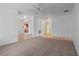 Spacious living room featuring carpet, a ceiling fan, and an open layout at 885 Little Bend Rd, Altamonte Springs, FL 32714