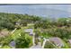 Aerial view of the lakefront community, showcasing lake access and community area at 11648 Grand Bay Blvd, Clermont, FL 34711