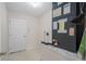 Utility room includes storage space and the home's air conditioning unit at 11648 Grand Bay Blvd, Clermont, FL 34711