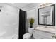 Stylish bathroom featuring a stand up shower and vanity with storage, creating a clean and functional space at 122 Seville Rd, Auburndale, FL 33823