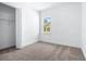 Bedroom with neutral carpet and window with yard view at 1249 Champions Dr, Daytona Beach, FL 32124