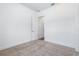 Bedroom with neutral carpet and attached room at 1249 Champions Dr, Daytona Beach, FL 32124