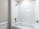 Bathroom with white subway tile and updated fixtures at 1262 Champions Dr, Daytona Beach, FL 32124