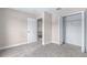 An empty bedroom features an open closet with access to another room at 1262 Champions Dr, Daytona Beach, FL 32124